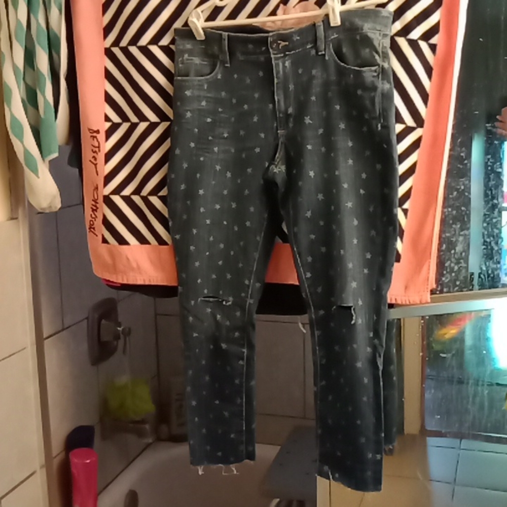 Ripped star print jeans